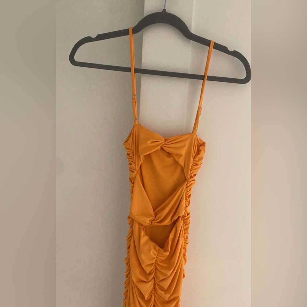 orange open back bow dress